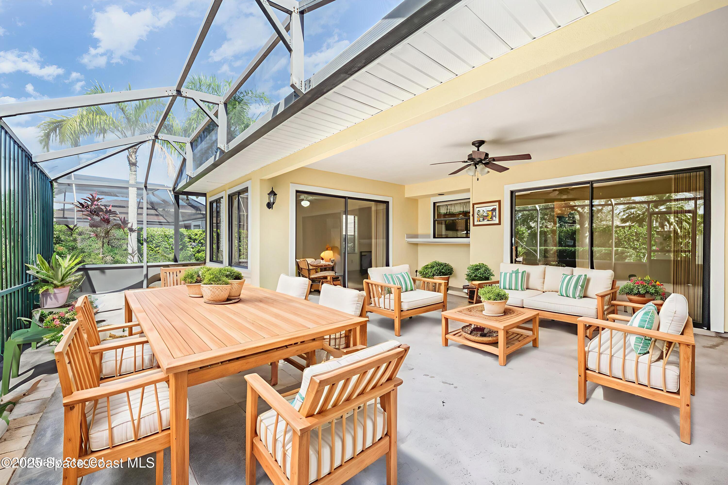 1652 Independence Avenue Melbourne, FL 32940 - Photo 23 of 38 a building outdoor space with patio furniture and potted plants