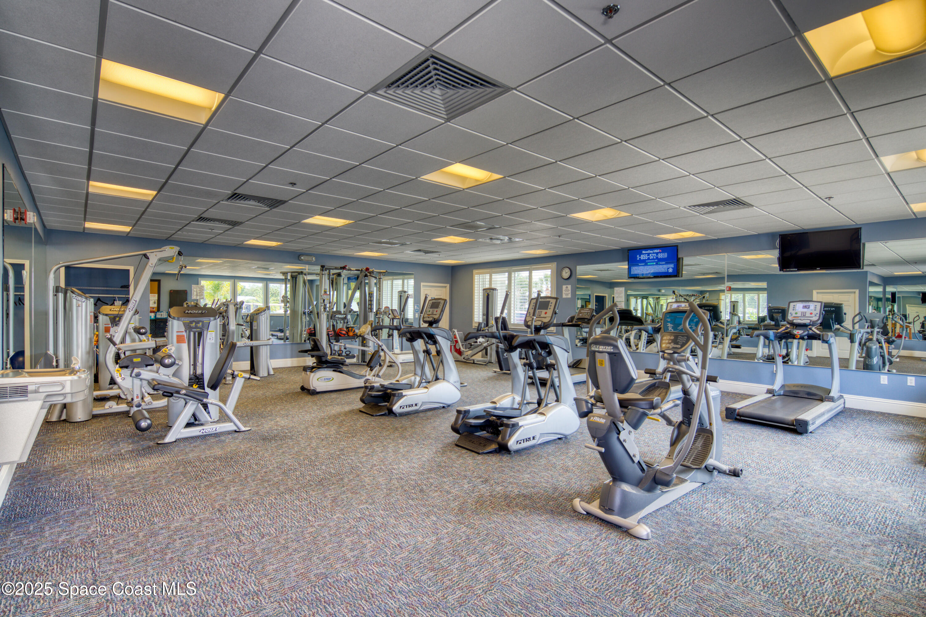 1652 Independence Avenue Melbourne, FL 32940 - Photo 32 of 38 a view of a room with gym equipment