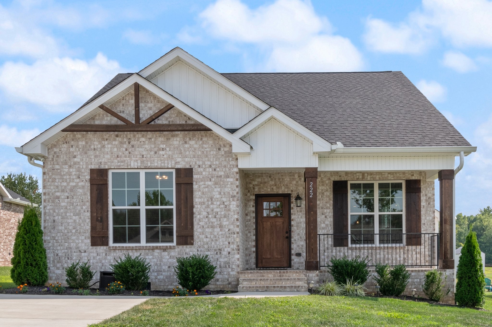 222 Julia Ann Court Springfield, TN 37172 - Photo 1 of 16 a front view of a house with garden