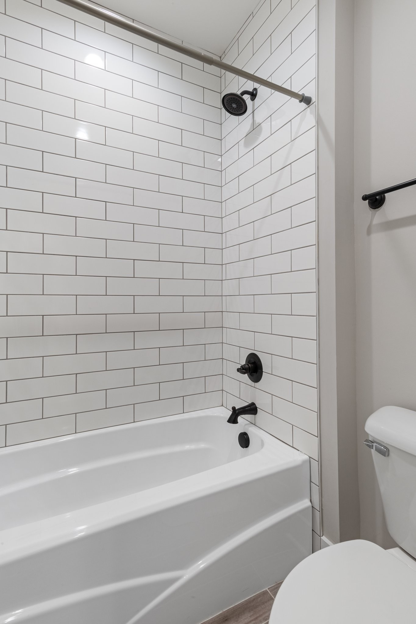 222 Julia Ann Court Springfield, TN 37172 - Photo 11 of 16 a bathroom with a toilet and a bathtub