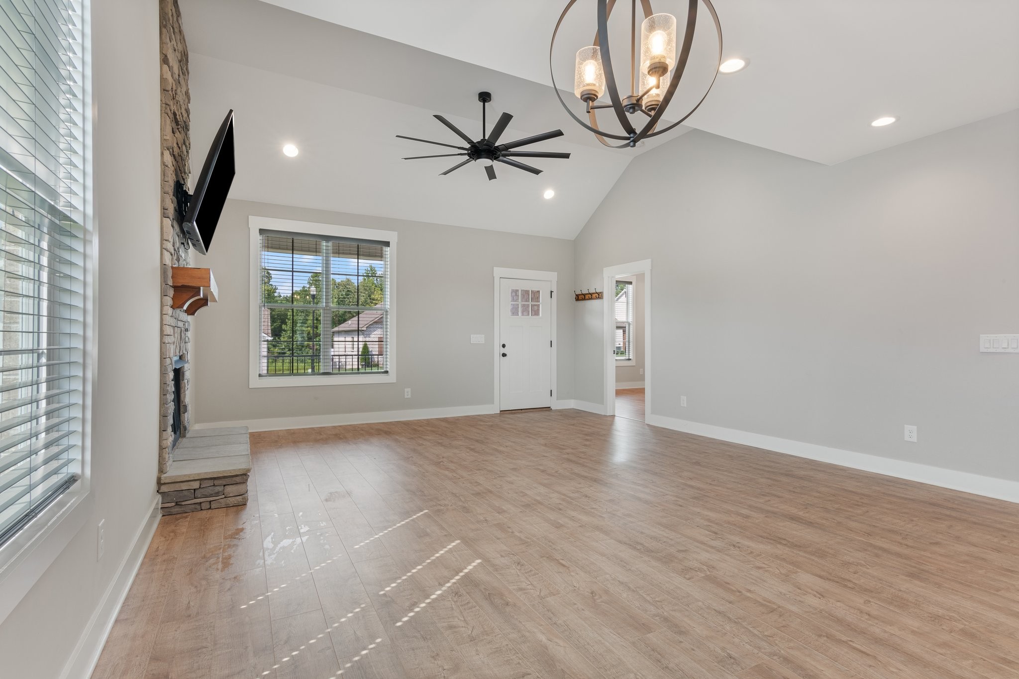 222 Julia Ann Court Springfield, TN 37172 - Photo 4 of 16 wooden floor in an empty room with a window