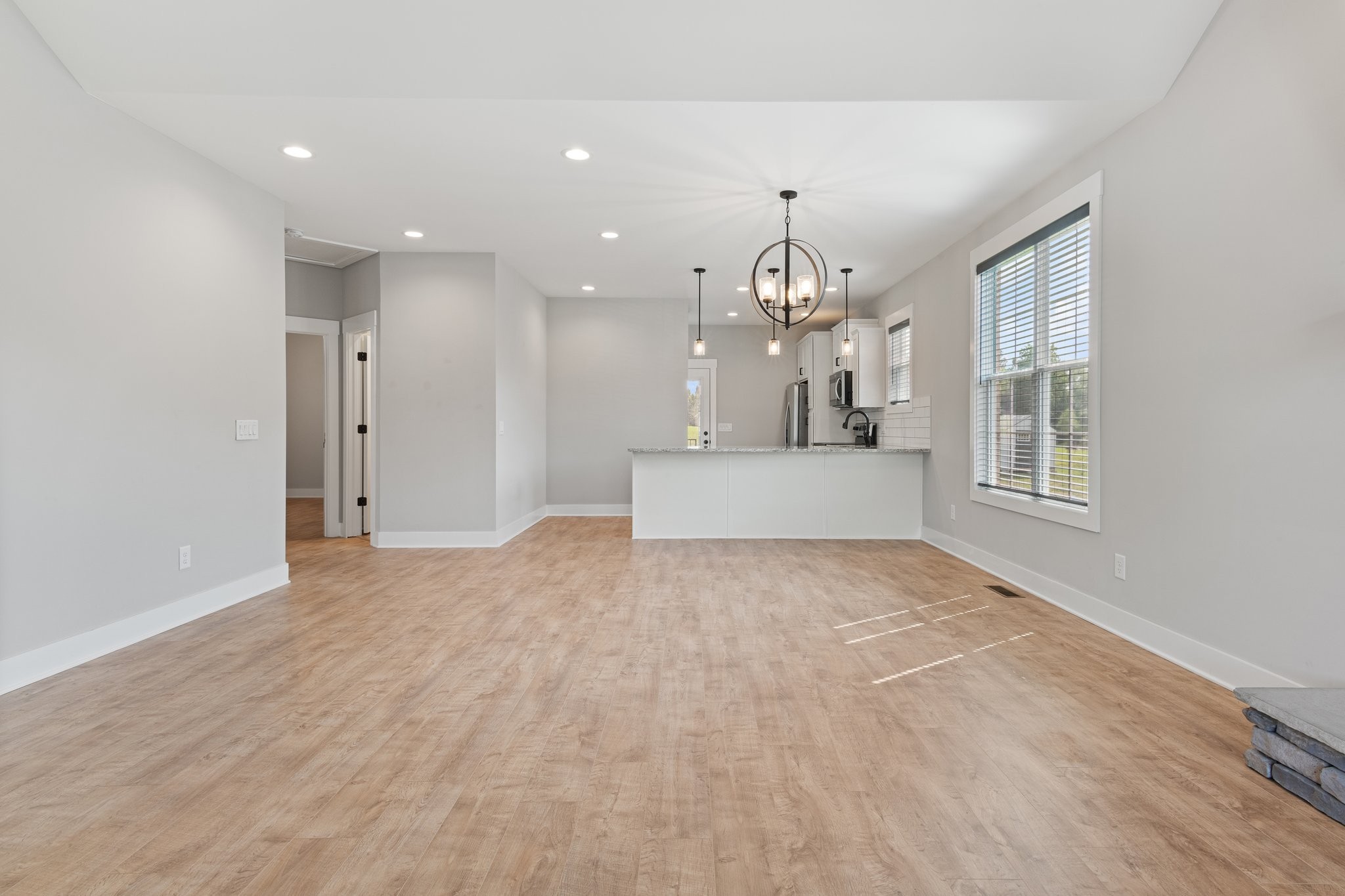 222 Julia Ann Court Springfield, TN 37172 - Photo 5 of 16 a view of an empty room and kitchen view