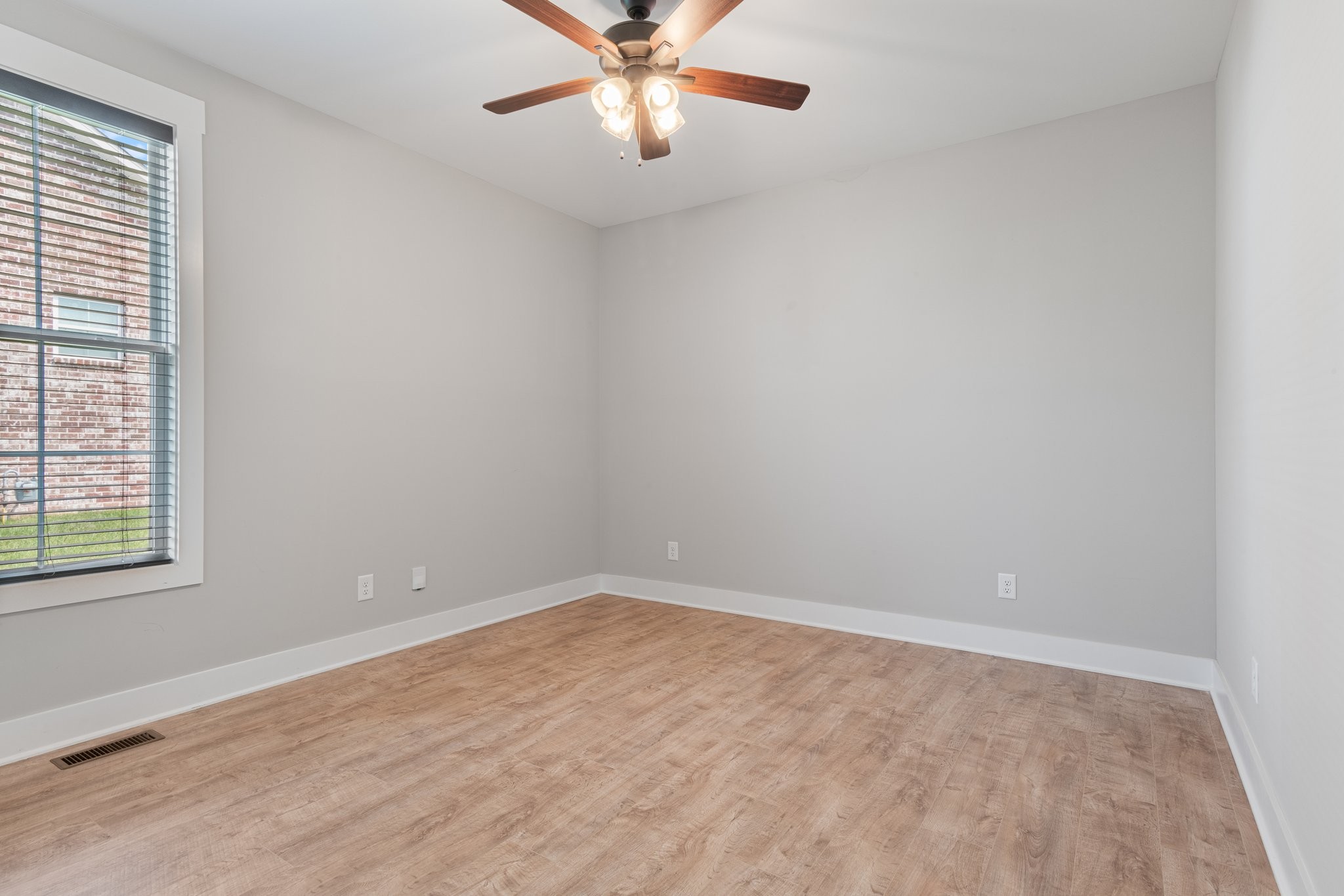 222 Julia Ann Court Springfield, TN 37172 - Photo 8 of 16 an empty room with windows and fan