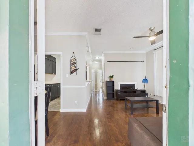 a living room with furniture and a table