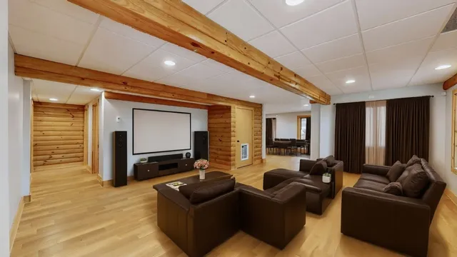 a backyard of a house with lots of green space and a fountain