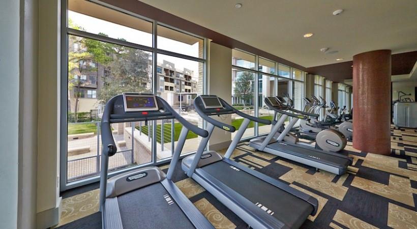 2728 Cedar Springs Road, Unit 1801 Dallas, TX 75201 - Photo 22 of 26 a view of a room with gym equipment