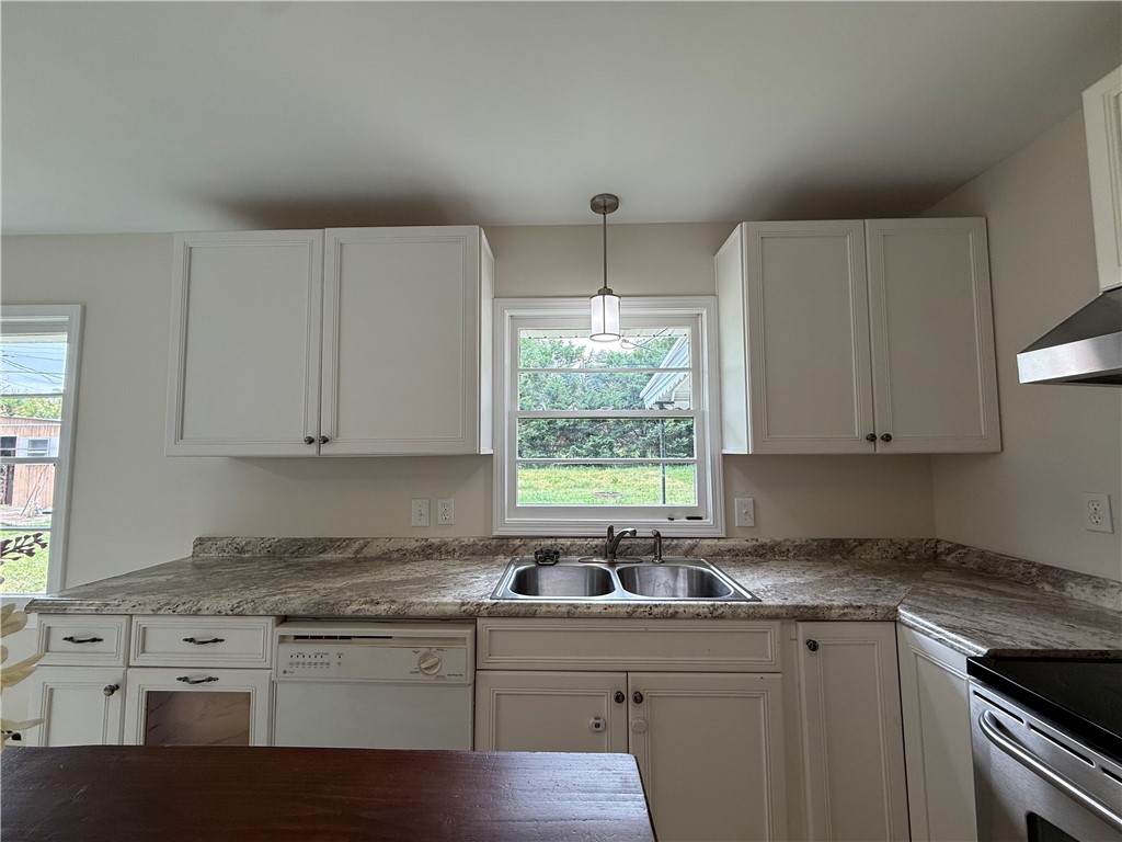 2304 Poplar Lane Anderson, SC 29621 - Photo 17 of 33 Bright and airy, this kitchen features ample cabinet space and a lovely view.