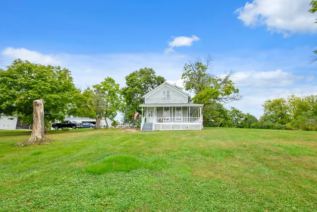 a view of a house with a big yard