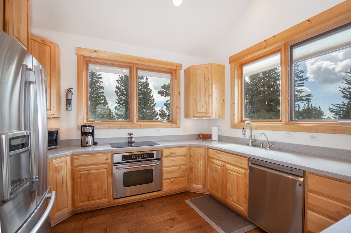 301 Polaris Road Fairplay, CO 80440 - Photo 11 of 35 a kitchen with a sink stove and cabinets