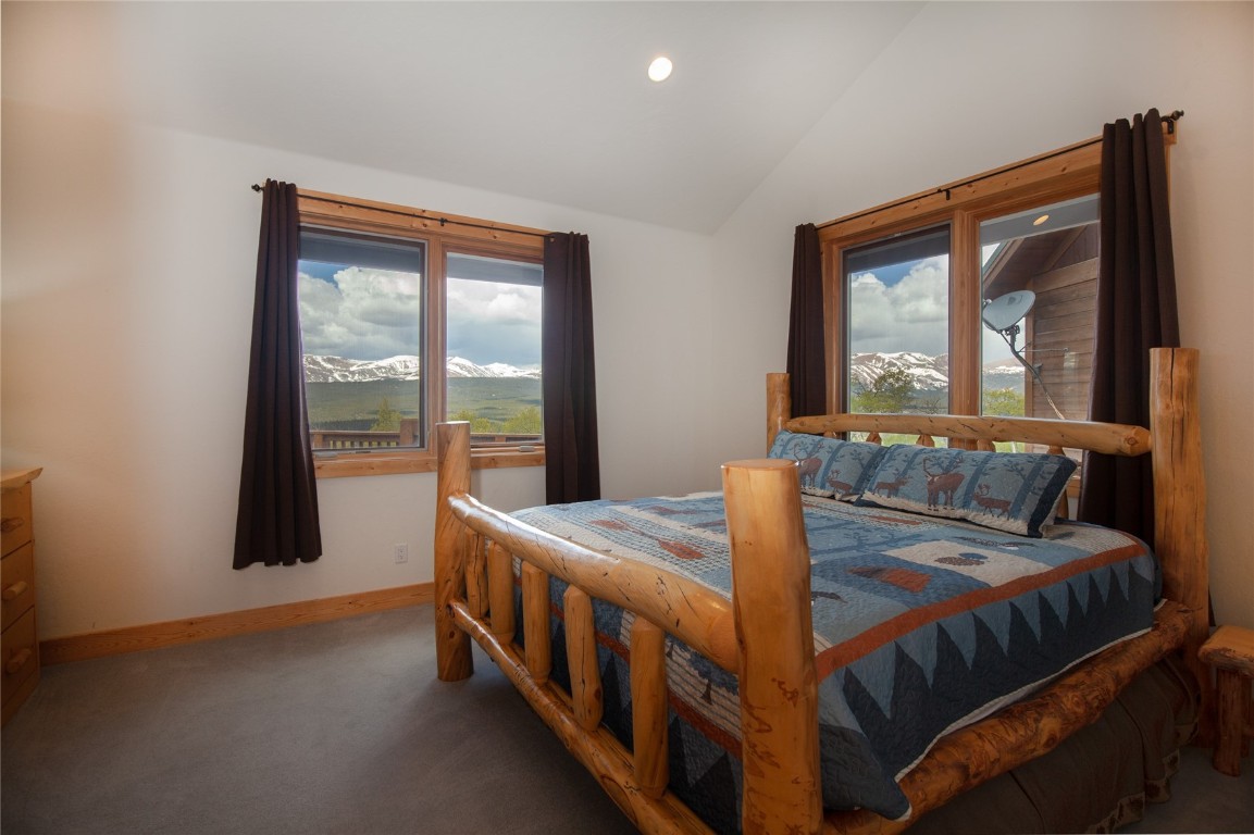 301 Polaris Road Fairplay, CO 80440 - Photo 14 of 35 a bed sitting in a bedroom next to a window