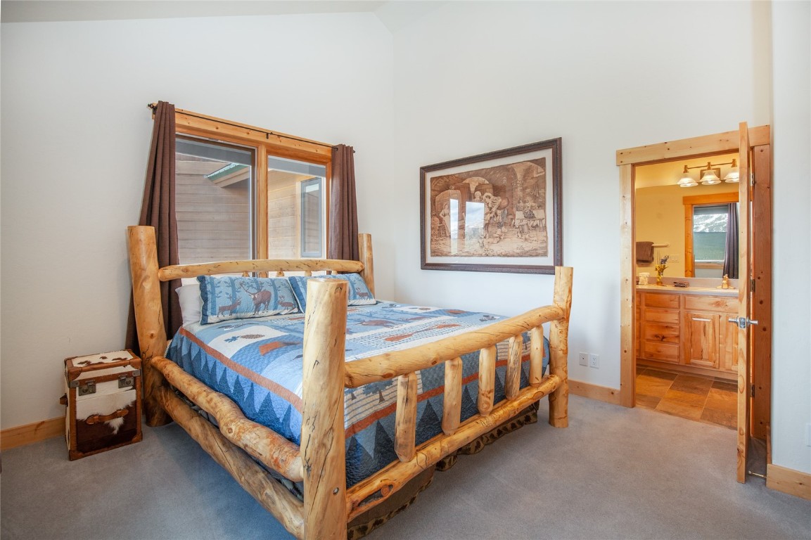 301 Polaris Road Fairplay, CO 80440 - Photo 15 of 35 a view of a bedroom with furniture and window
