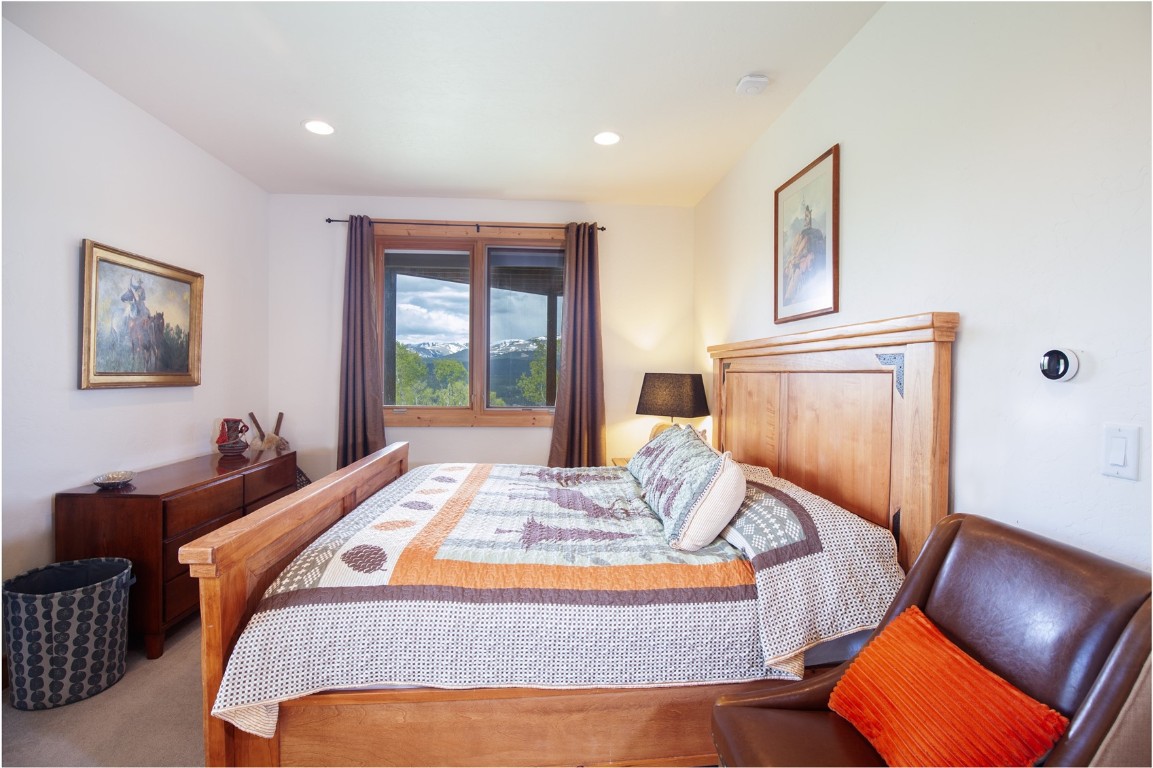 301 Polaris Road Fairplay, CO 80440 - Photo 22 of 35 a bedroom with bed and window