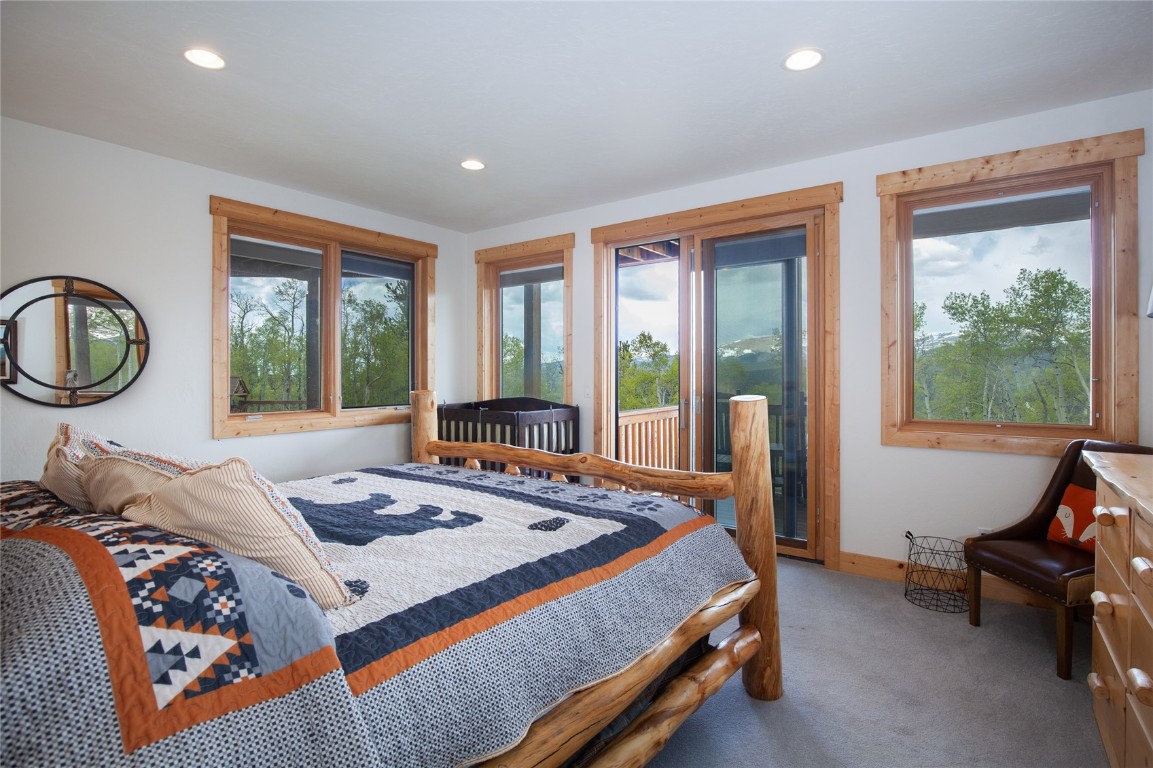 301 Polaris Road Fairplay, CO 80440 - Photo 23 of 35 a bedroom with a bed and a window