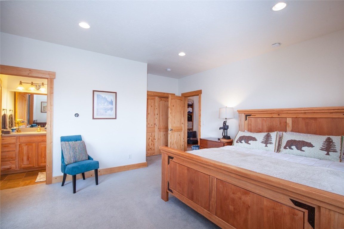 301 Polaris Road Fairplay, CO 80440 - Photo 27 of 35 a bedroom with a bed and a couch