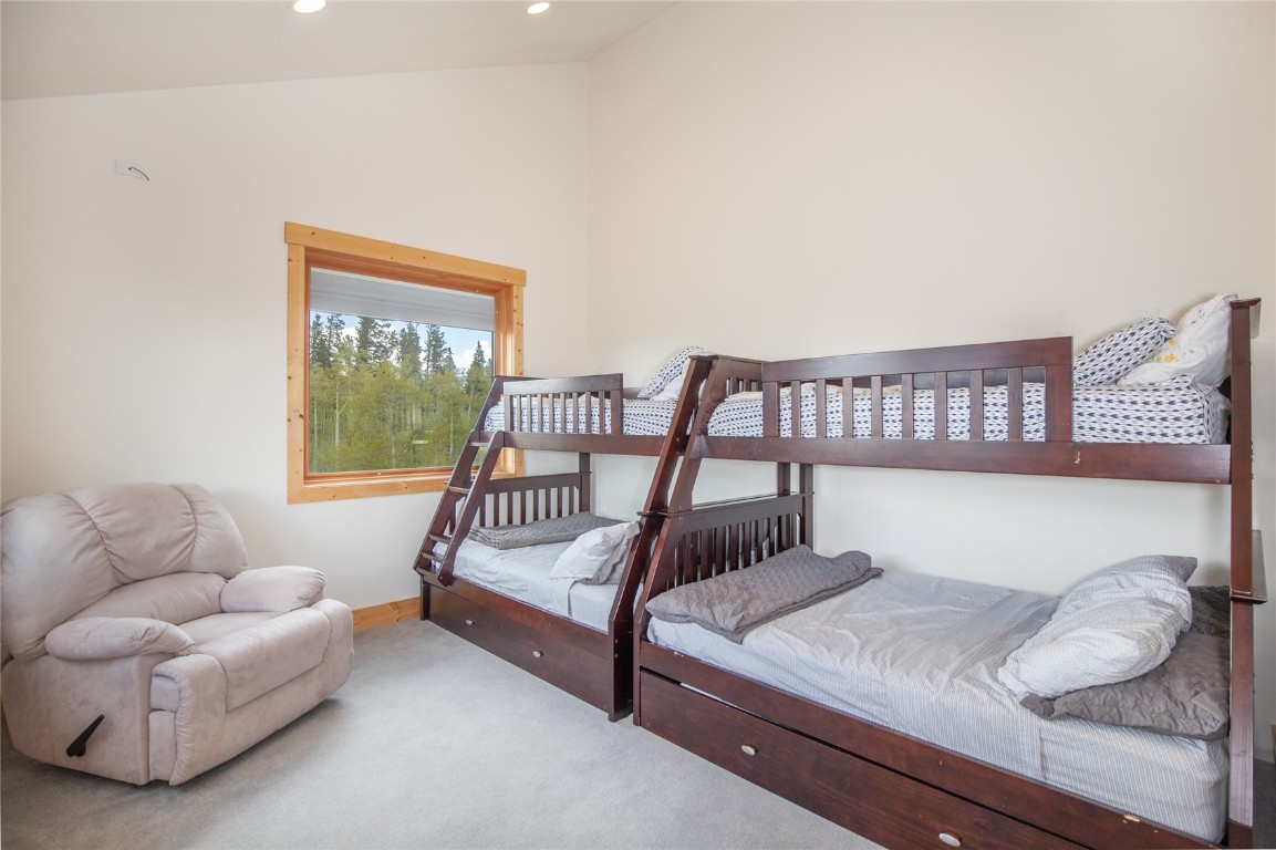 301 Polaris Road Fairplay, CO 80440 - Photo 30 of 35 a bedroom with furniture and a large window