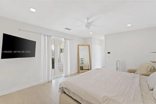 a room with a fireplace and a window