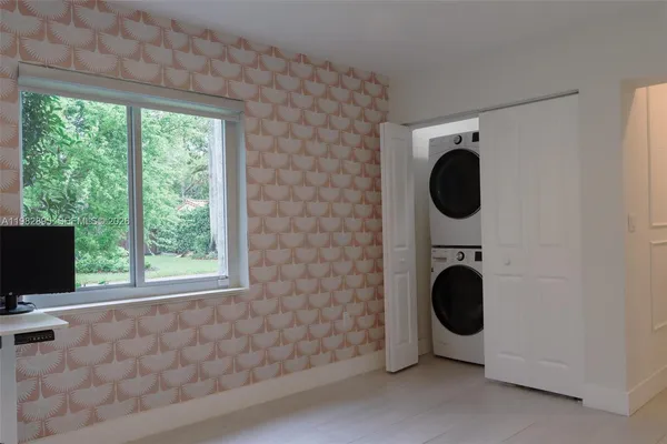 a view of an outside dining space with furniture window