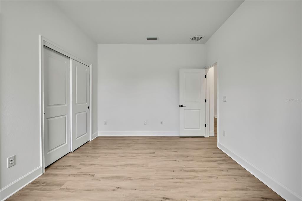 6589 Freeport Drive Spring Hill, FL 34608 - Photo 33 of 63 a view of an empty room