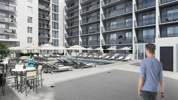 a view of a patio with swimming pool table and chairs