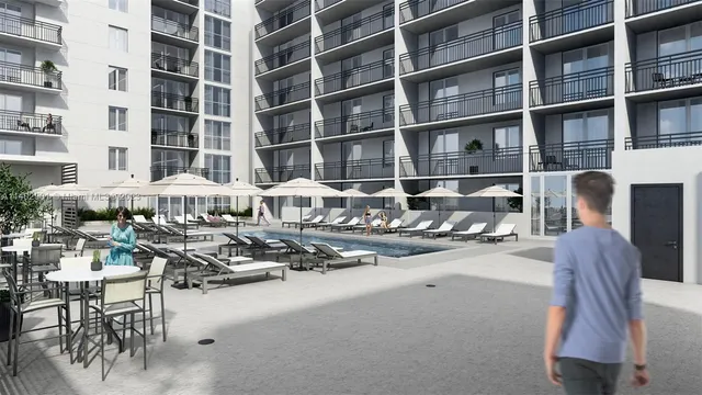 a view of a patio with swimming pool table and chairs