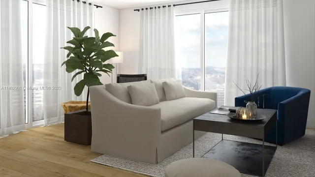 a living room with furniture a rug and white walls