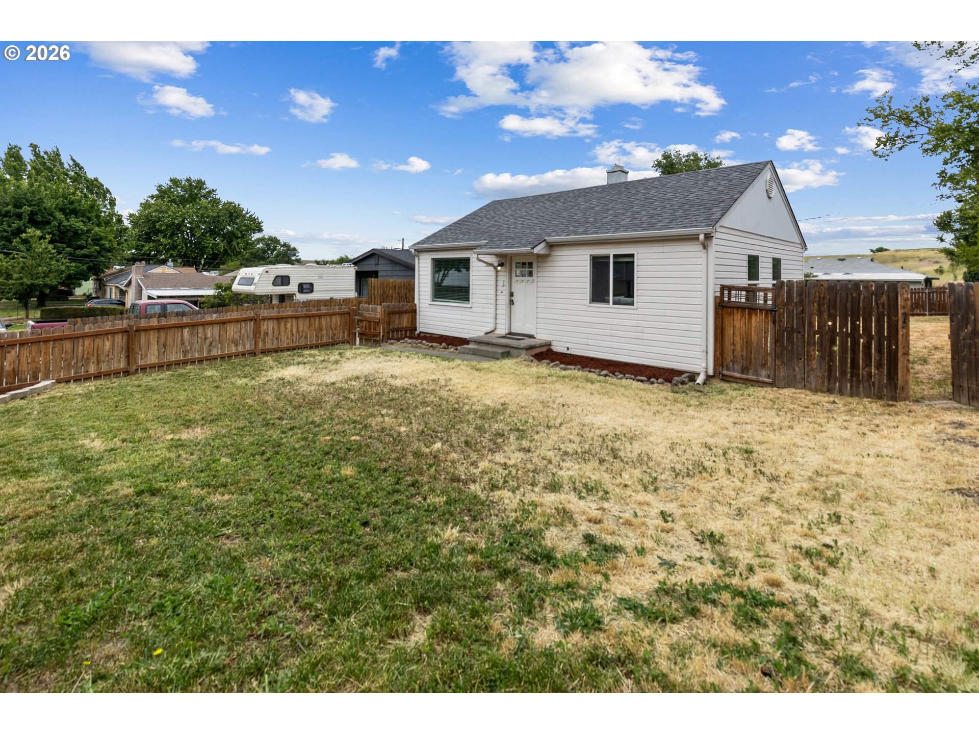 3009 Southwest Isaac Avenue Pendleton, OR 97801 - Photo 3 of 28 a view of a house with a yard