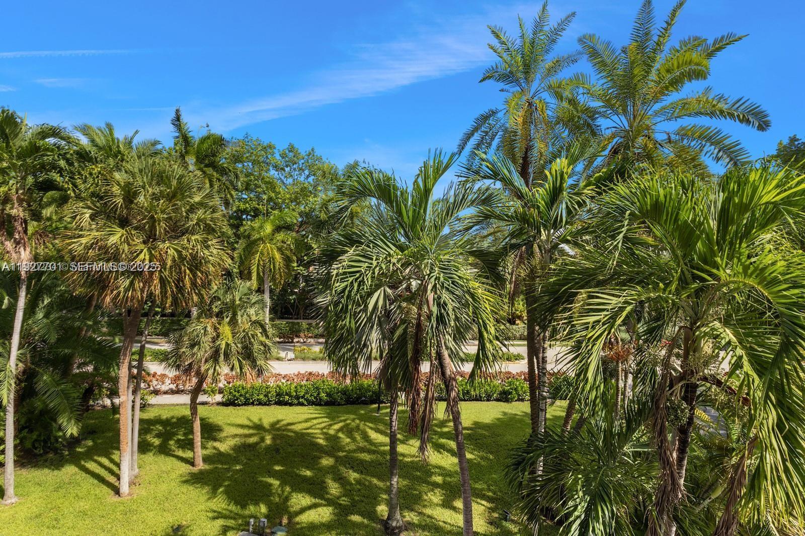 100 Ocean Ln Drive, Unit 304 Key Biscayne, FL 33149 - Photo 24 of 28 a view of a garden