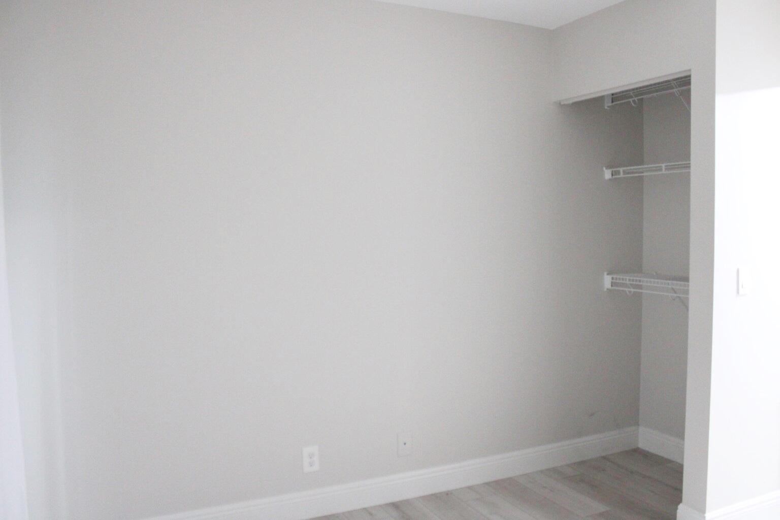 1006 Green Pine Boulevard, Unit A1 West Palm Beach, FL 33409 - Photo 21 of 25 a view of a hallway