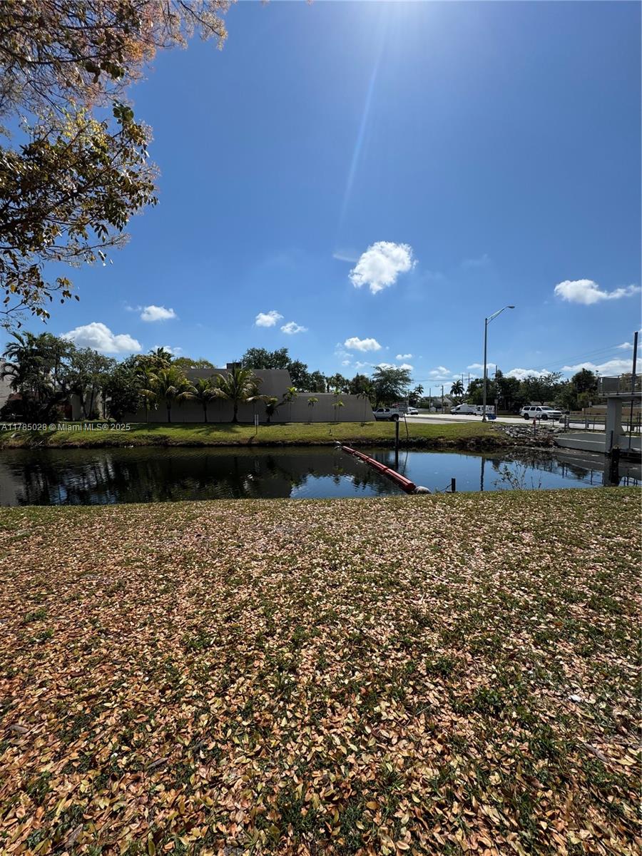 10353 North Kendall Drive, Unit BB2 Miami, FL 33176 - Photo 19 of 20 a view of a lake with a houses