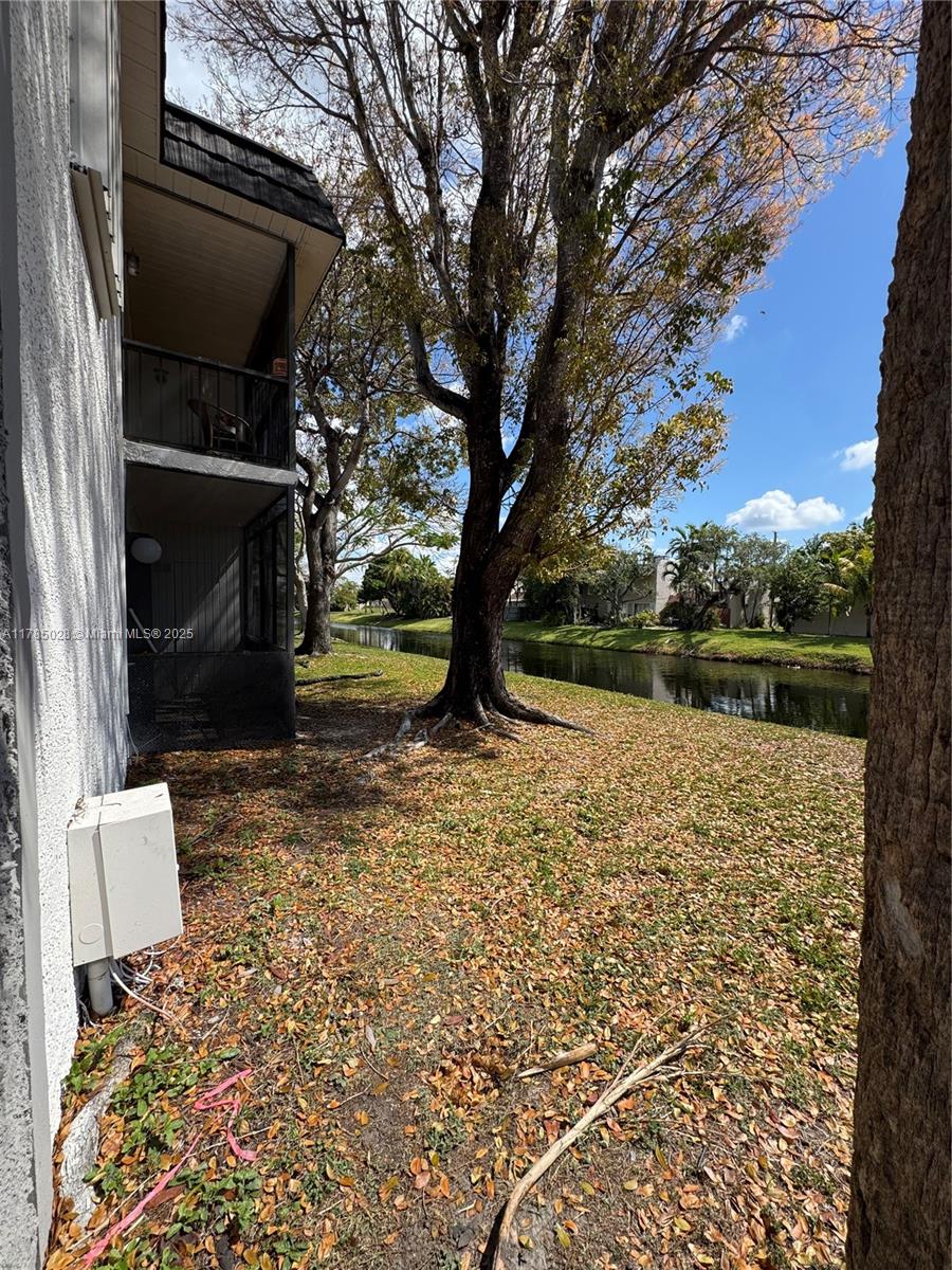 10353 North Kendall Drive, Unit BB2 Miami, FL 33176 - Photo 2 of 20 a view of outdoor space with garden
