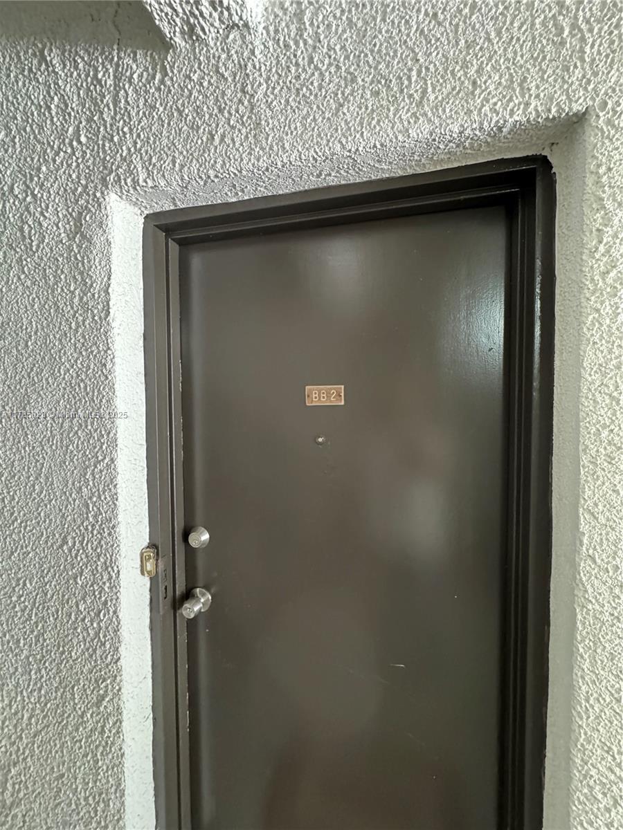 10353 North Kendall Drive, Unit BB2 Miami, FL 33176 - Photo 3 of 20 a close view of door