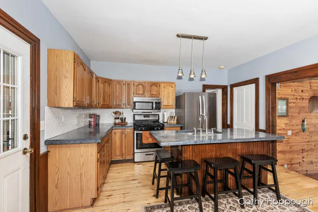 $425,000 | 420 Riverside Drive, Portland, MI 48875