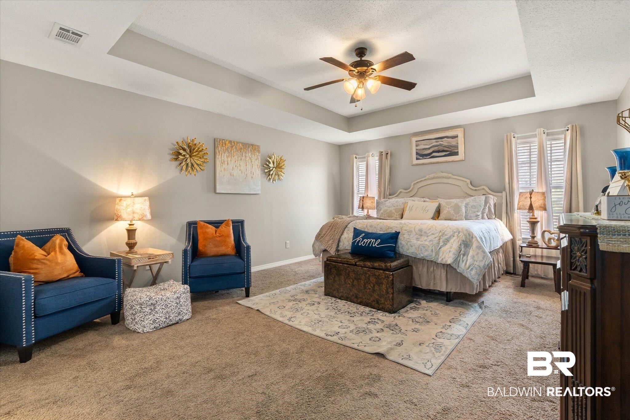 8600 Sable Court Semmes, AL 36575 - Photo 9 of 20 Bedroom with carpet floors, a raised ceiling, multiple windows, and a ceiling fan