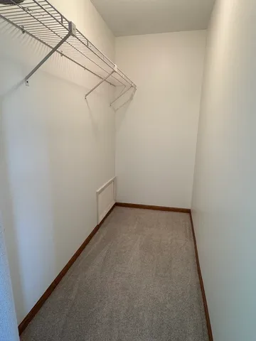 a view of a room with racks on the wall