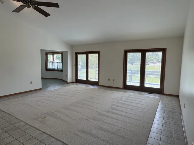 an empty room with windows