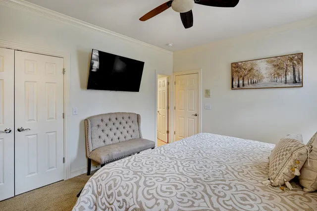 a bathroom with a granite countertop sink and a mirror with toilet