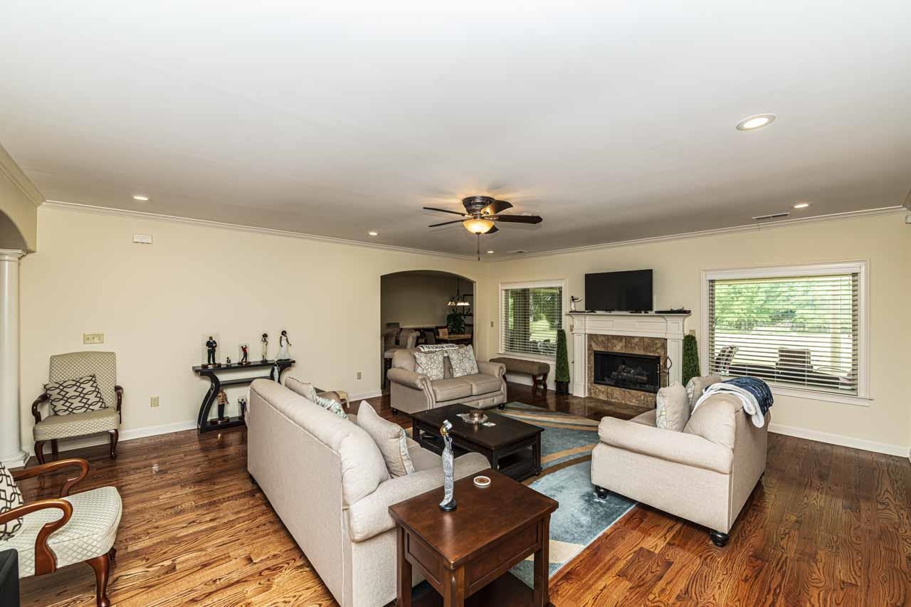 185 Belmont Road Mason, TN 38049 - Photo 10 of 38 Spacious living area featuring wood-finish flooring, a ceiling fan, and recessed lighting