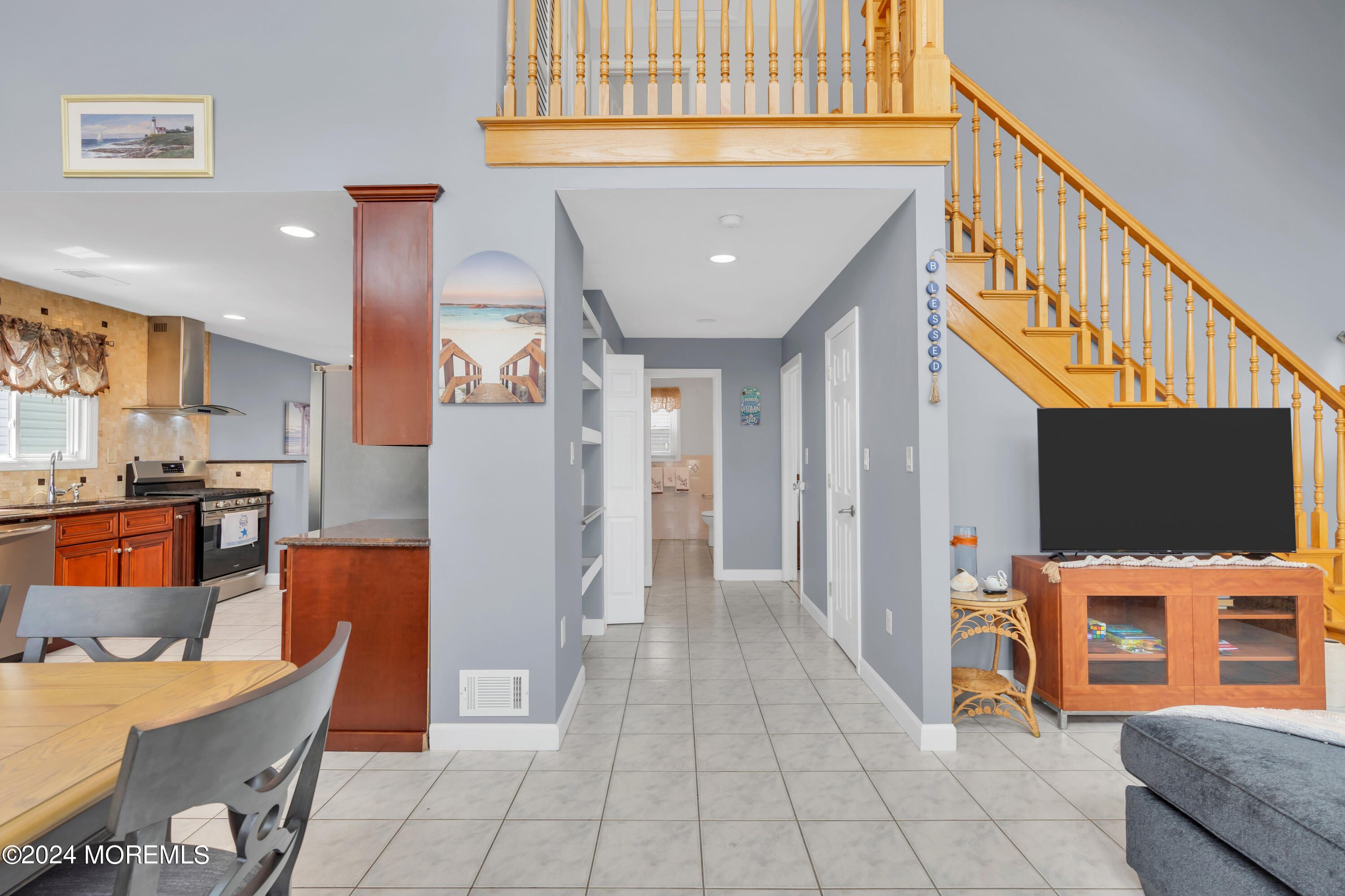 117 Harding Avenue Seaside Heights, NJ 08751 - Photo 7 of 28 a dining hall with stainless steel appliances granite countertop a refrigerator and a stove