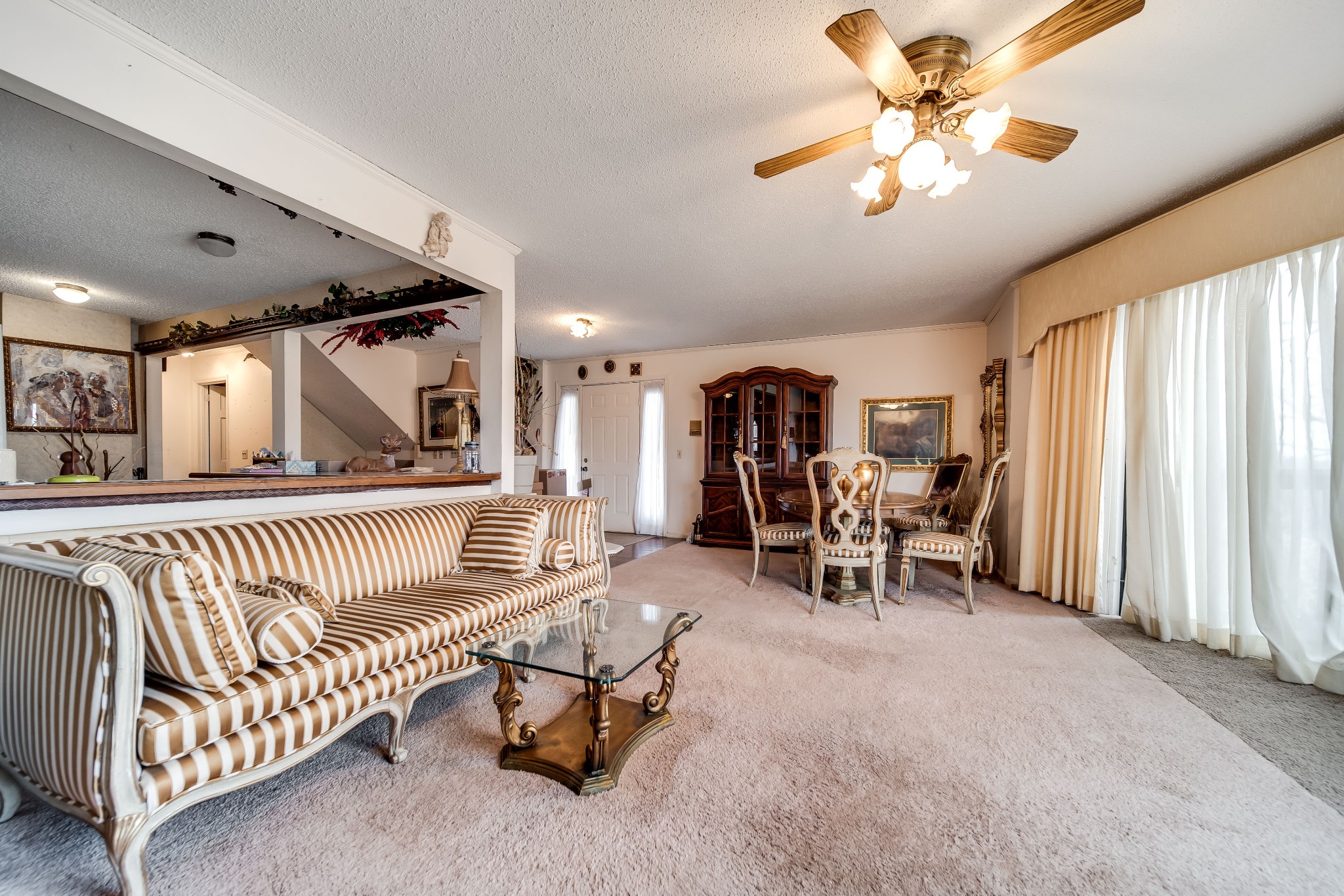 6040 New Cut Road Springfield, TN 37172 - Photo 13 of 37 a view of a livingroom with furniture and a ceiling fan