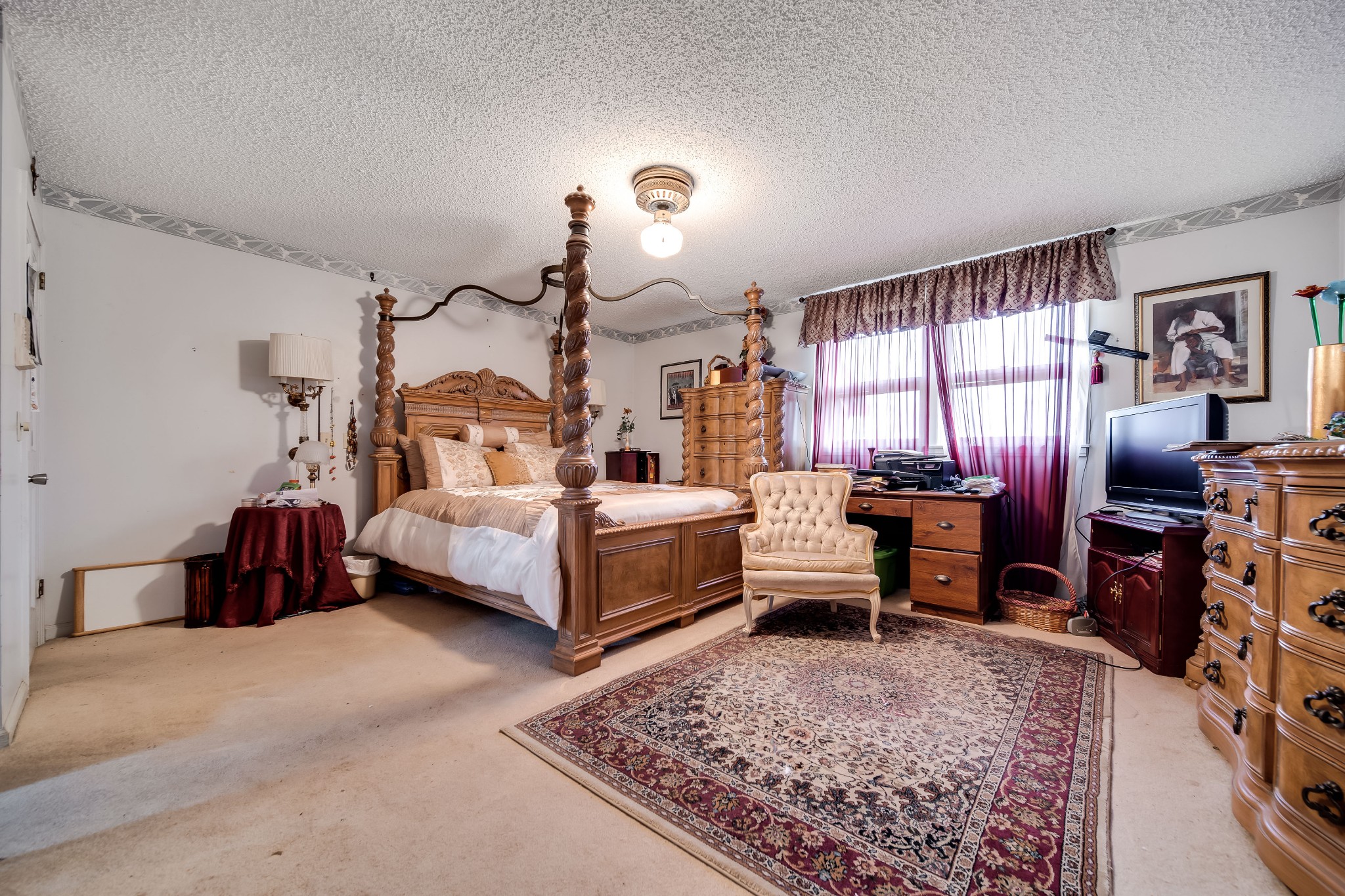 6040 New Cut Road Springfield, TN 37172 - Photo 17 of 37 a bedroom with furniture and a flat screen tv