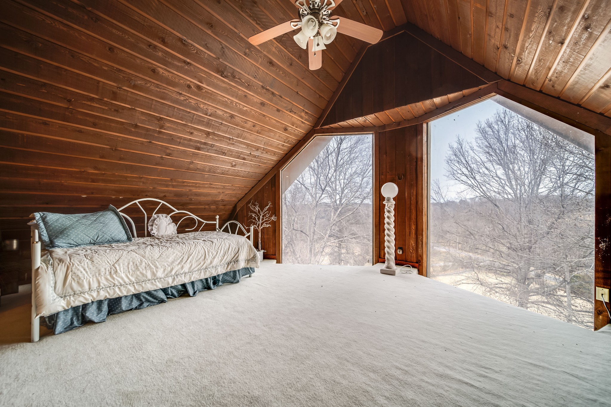 6040 New Cut Road Springfield, TN 37172 - Photo 21 of 37 a bed sitting in a bedroom next to a window