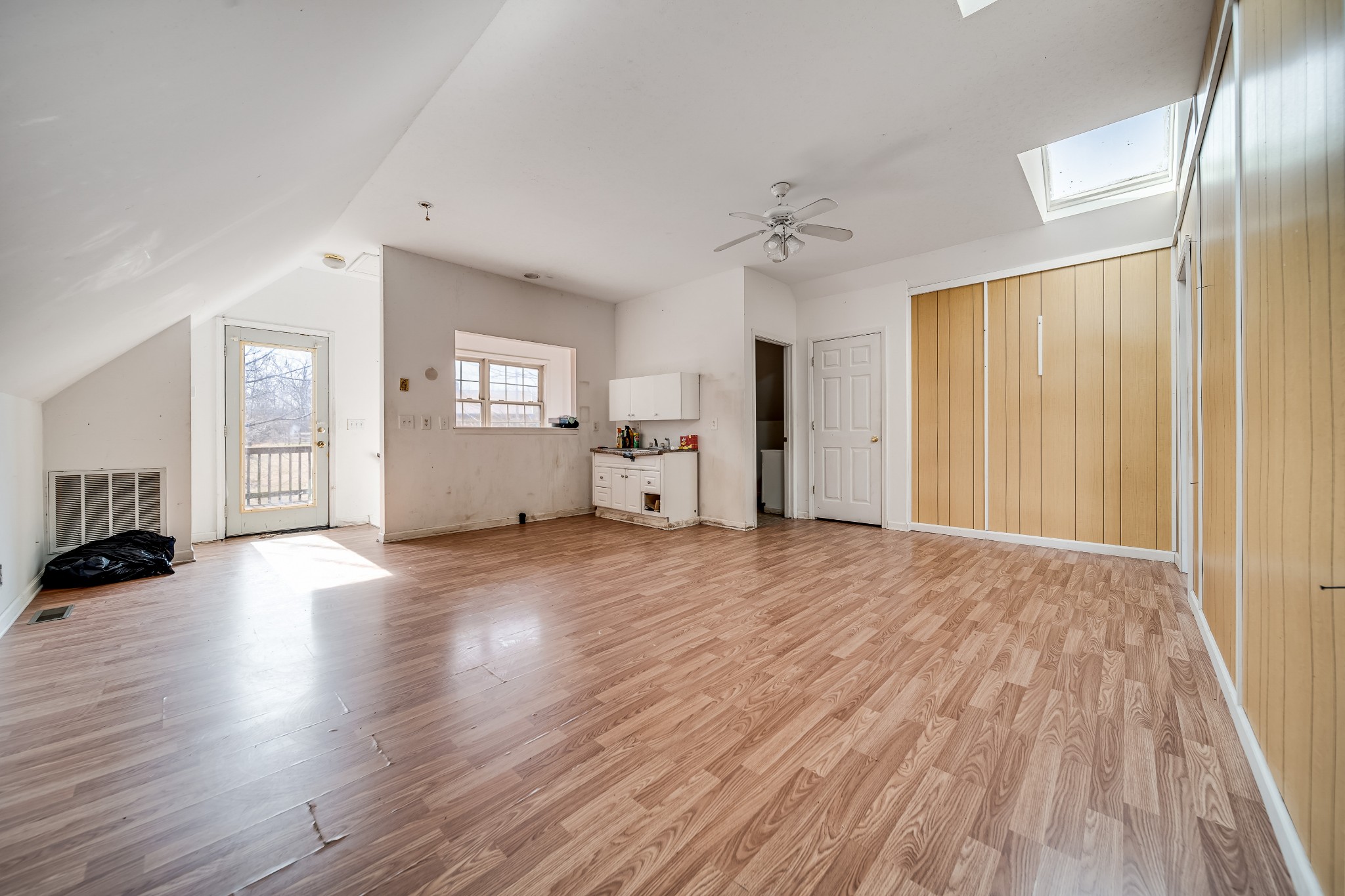 6040 New Cut Road Springfield, TN 37172 - Photo 30 of 37 a view of empty room with wooden floor and window