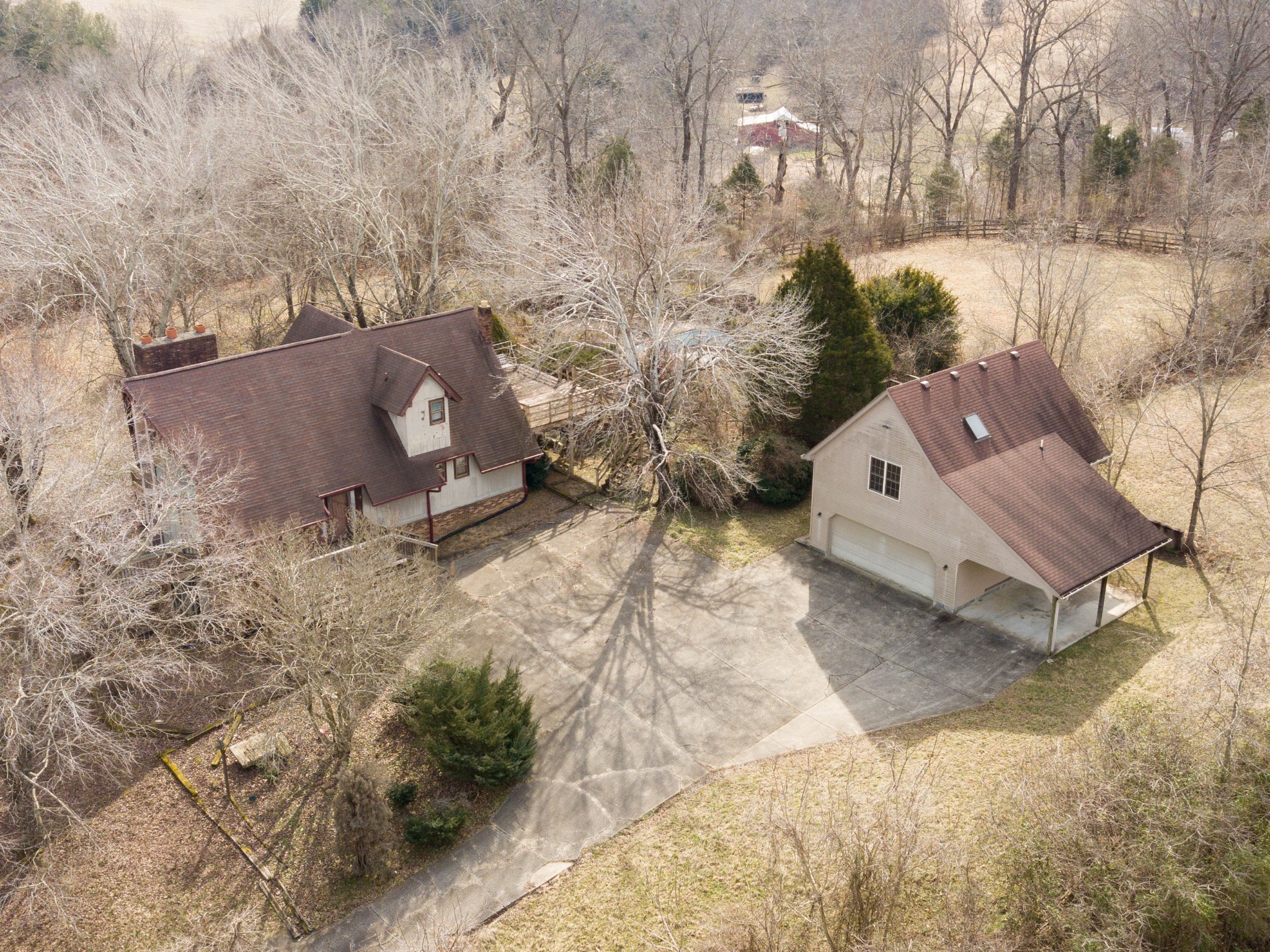 6040 New Cut Road Springfield, TN 37172 - Photo 36 of 37 an aerial view of a house with backyard and trees