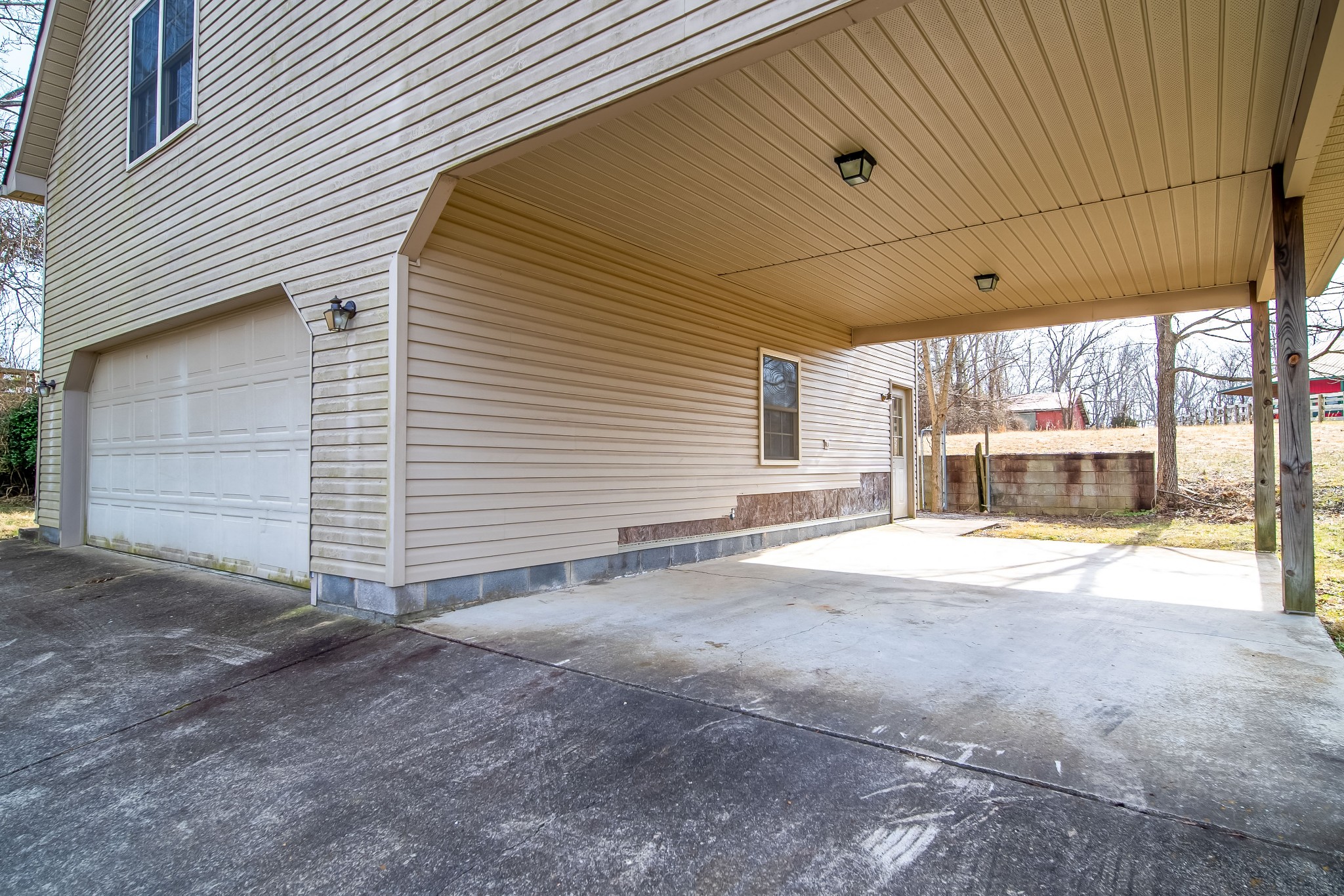 6040 New Cut Road Springfield, TN 37172 - Photo 10 of 37 a view of a house with a backyard and a garage