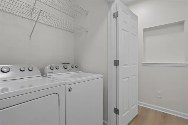 a utility room with dryer and washer
