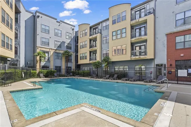 a view of a building with a yard