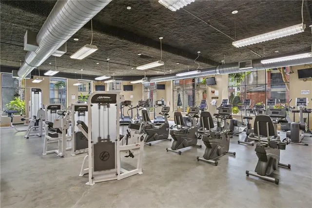 a view of entryway with a flower pot and wooden floor