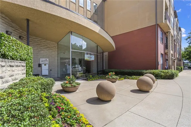 a picture of a bench in front of a building