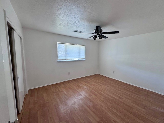 2006 Seagate Lane Houston, TX 77062 - Photo 17 of 22 wooden floor in an empty room with a window