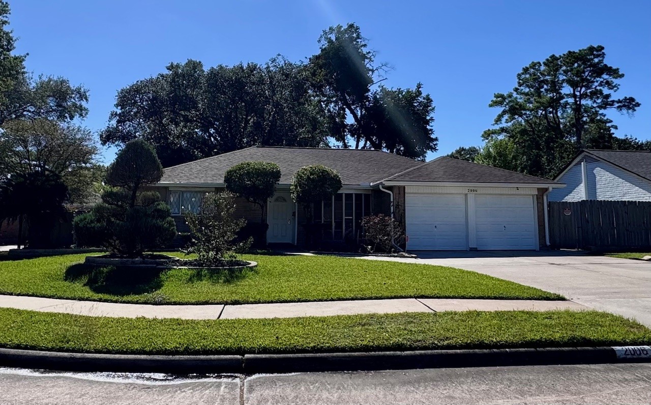 2006 Seagate Lane Houston, TX 77062 - Photo 22 of 22 a view of a house with a yard